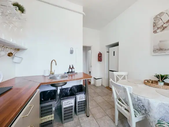 Bright kitchenette and dining space at Koolrooms Tallinn for comfortable guest stays.