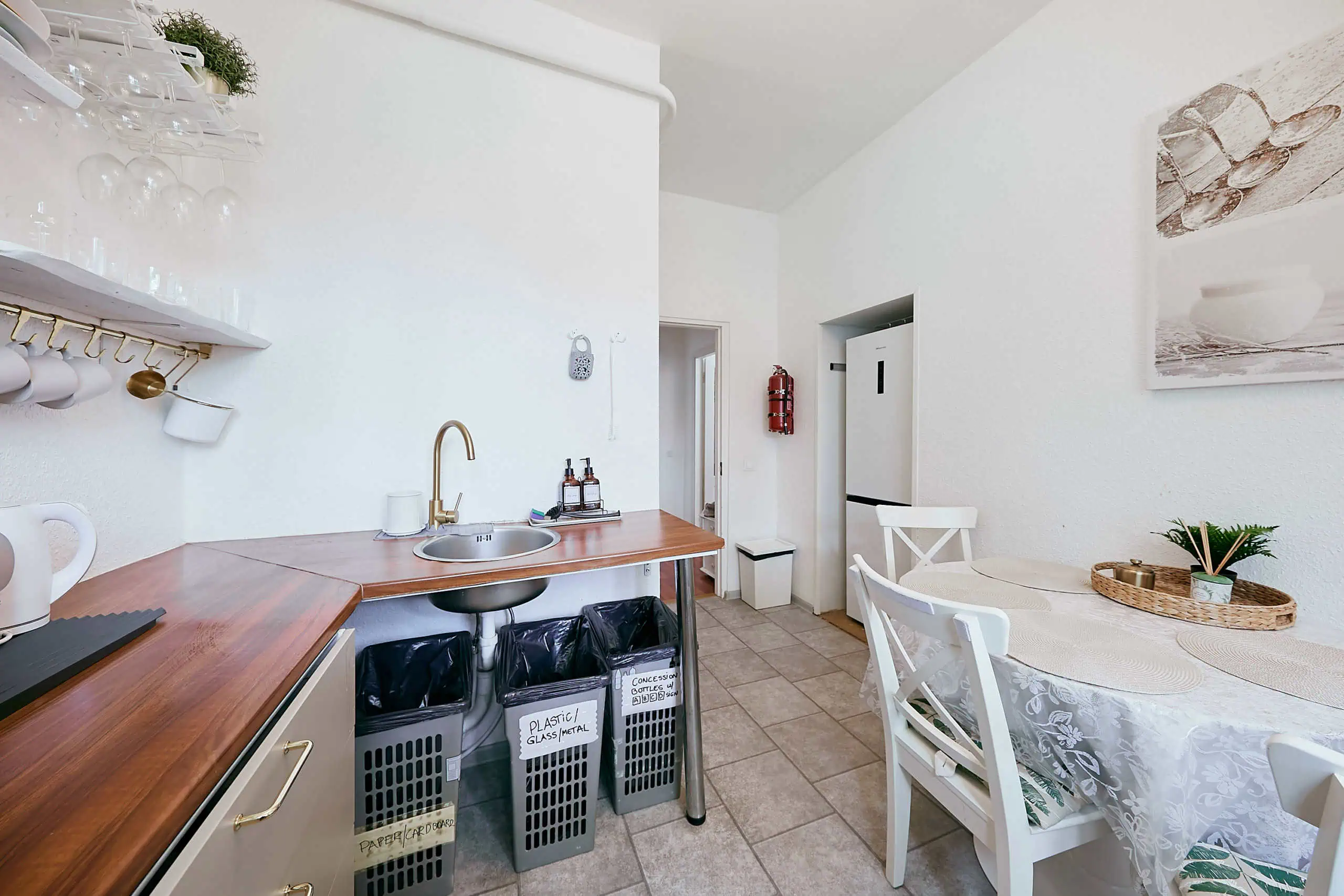 Bright kitchenette and dining space at Koolrooms Tallinn for comfortable guest stays.