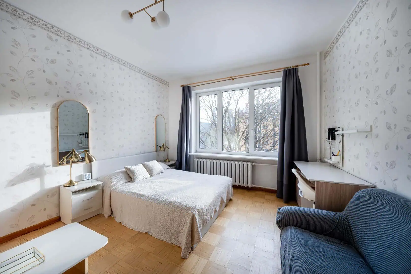 Stylish hotel room at KoolroomsTallinn, perfect for guests seeking comfort and modern design.